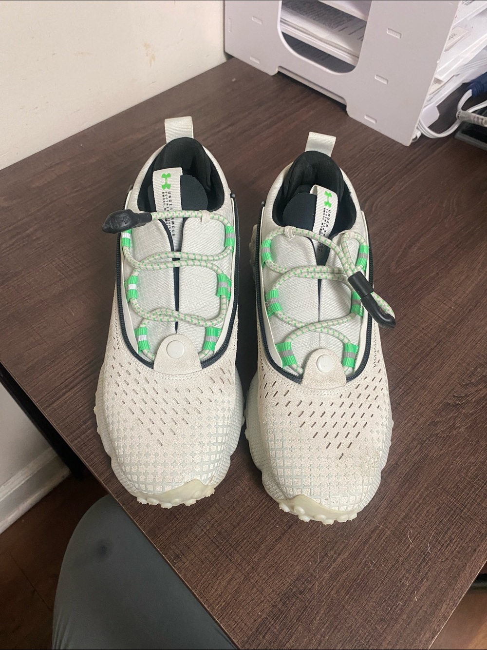 Under Armour men’s Cream and Green Slip-On Athletic Sneakers, then women size 10